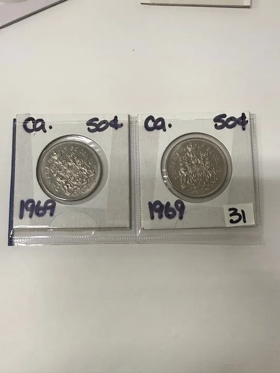 Two 1969 Fifty Cent Canadian Coins