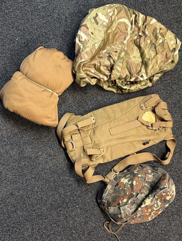 Military Gear Lot: Camouflage Helmet Covers, Tactical Backpack, Brown Scarf/Snood Set