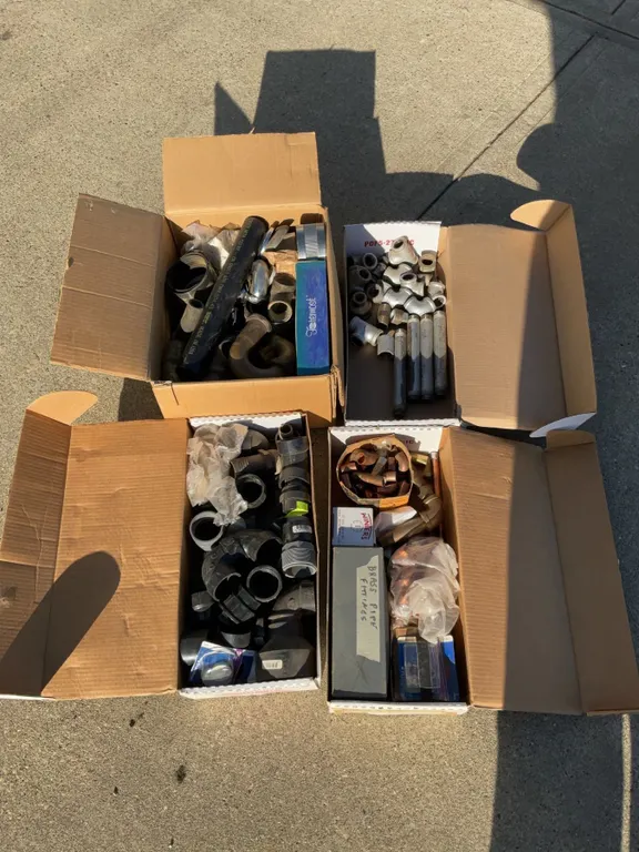 4 Boxes: Plumbing Pipe Fittings and Connectors, Mixed Materials