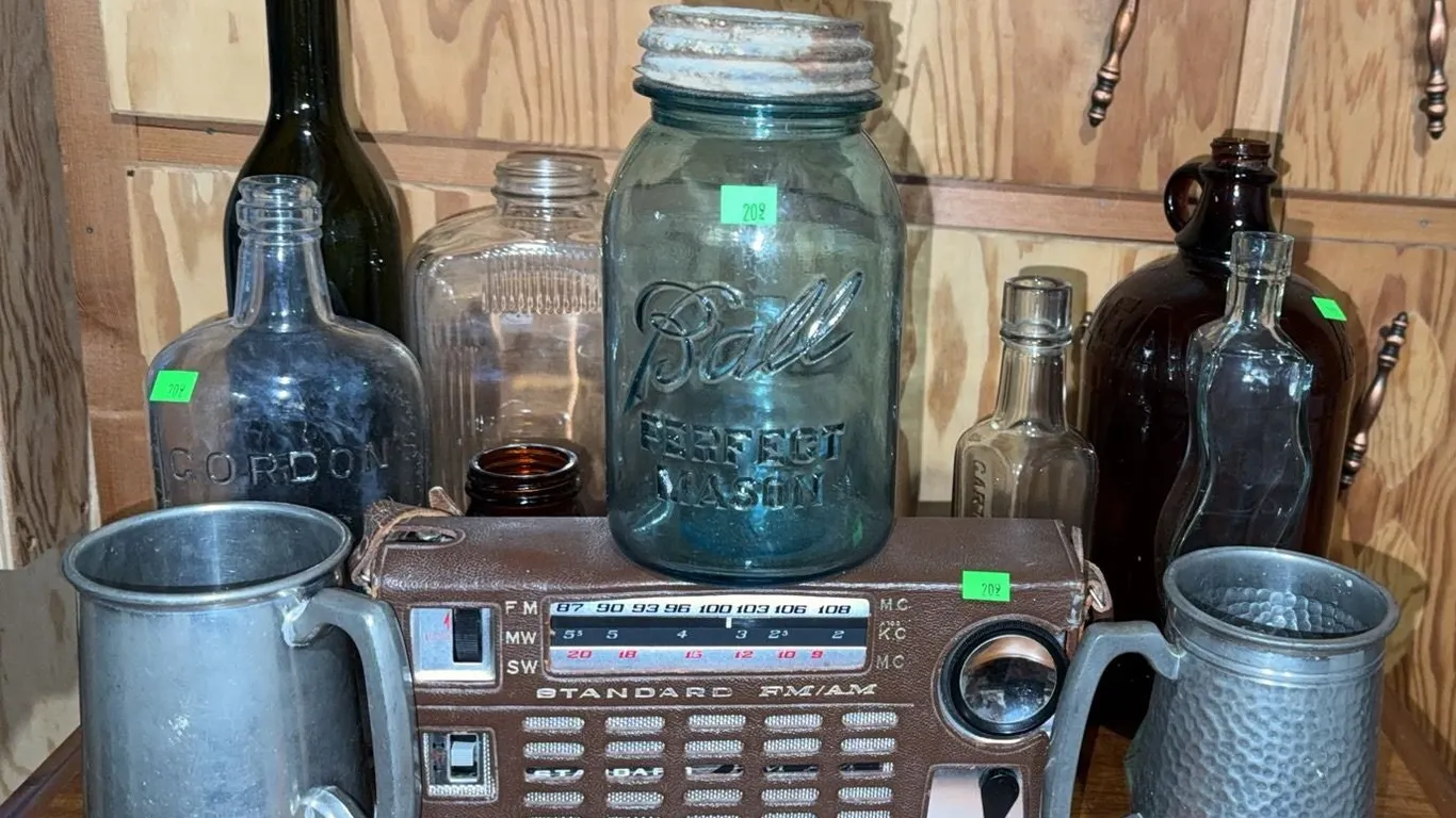 Standard FM/AM TR-9 Portable Radio, Ball Mason Jar, and Assorted Bottles
