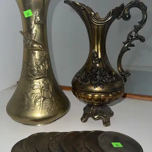 2 Decorative Brass Vases and 8 Brass Coasters