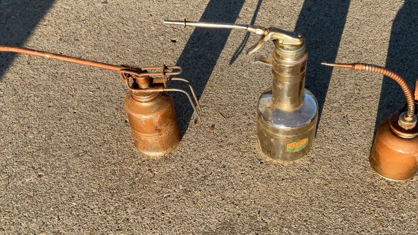 Vintage Oil Cans and Chrome Vehicle Air Horns