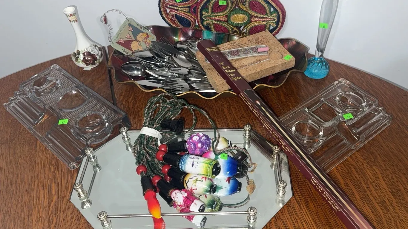 Household Items Including Cutlery, Glassware, and Decorative Pieces