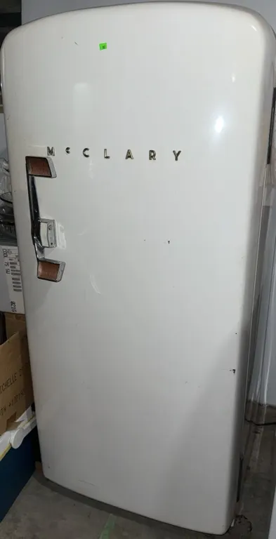 McClary Single-Door Refrigerator with Chrome Handle and Interior Freezer