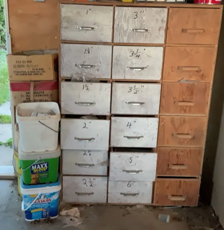 Workshop Drawer Unit With Assorted Nails, Hardware, and Boxes