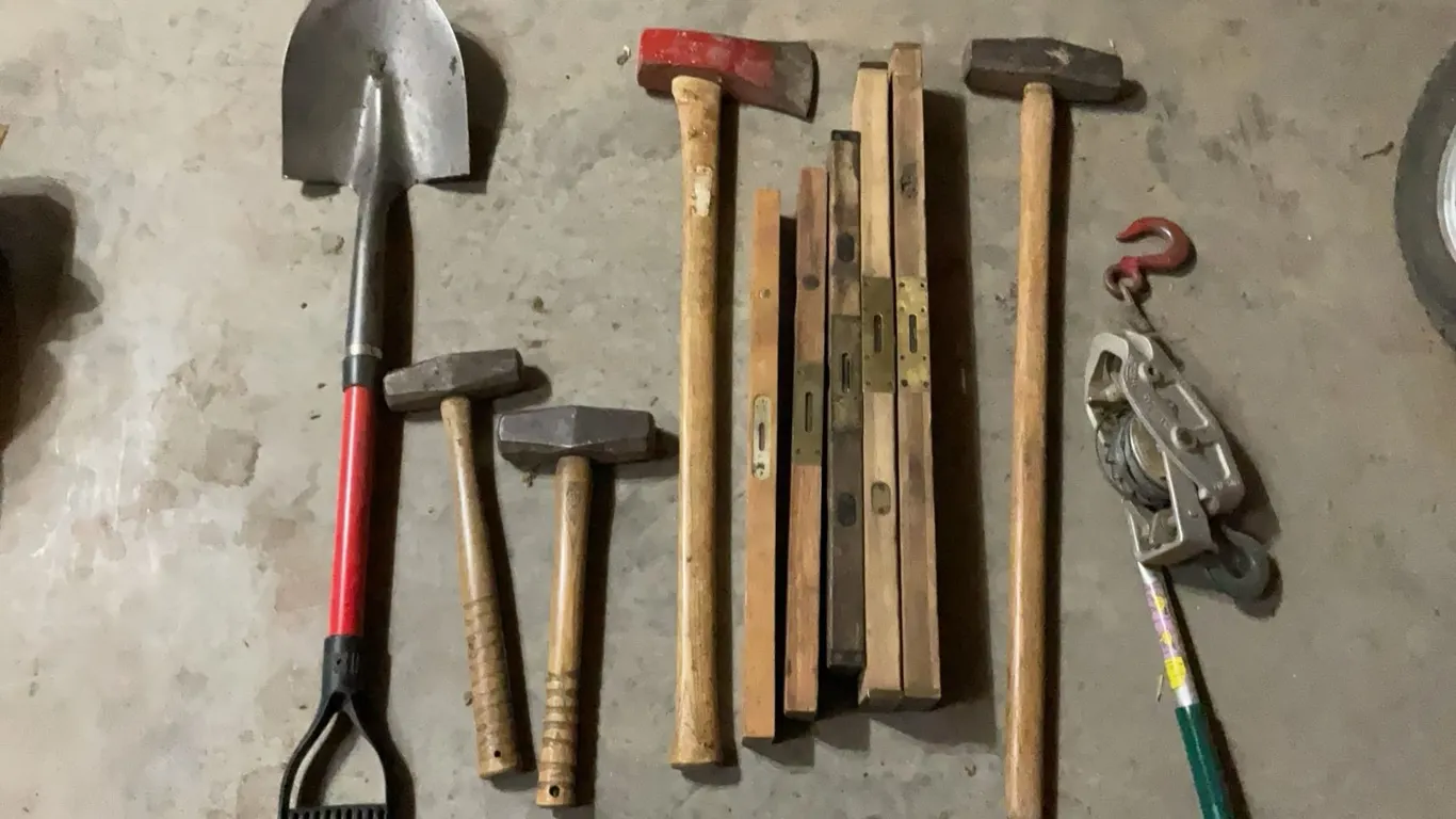 Shovel, Sledge Hammers, Ax, Come-Along Winch, and Five Wooden Levels