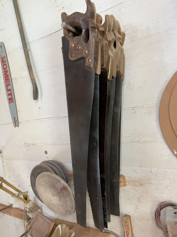 8 Hand Saws, 2 Aerators, Crowbar, and 8 Grinding Wheels