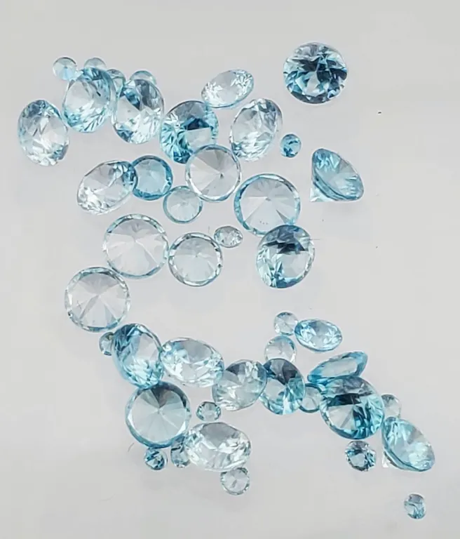 Blue Zircons (10.35 ct, 1.5–4.5 mm Round)