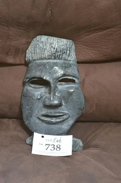 A Man's Face With Hollow Eyes.