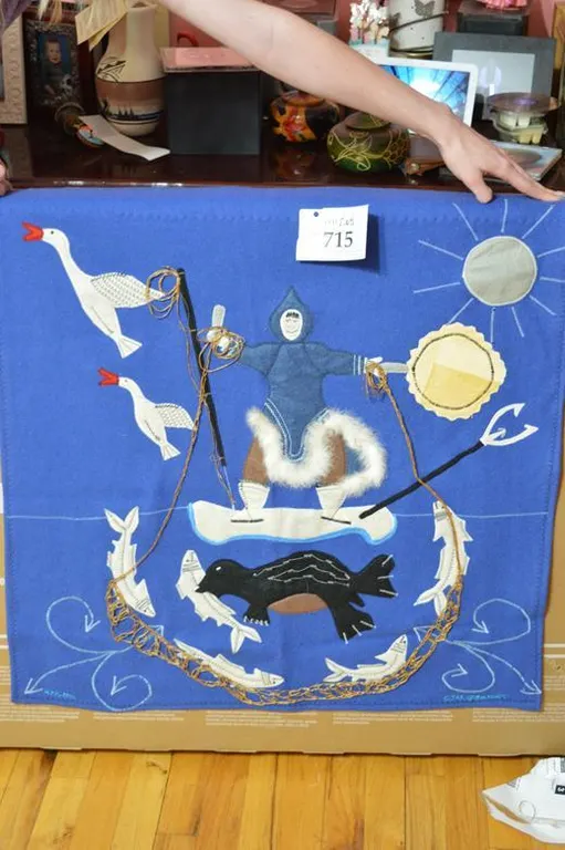 Fisherman Standing On Ice With Fishing Spear, Hook, Net Full Of Fish With A Seal Stealing A Fish