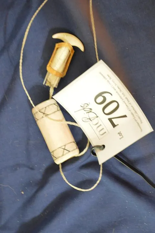 Decorated Sewing Kit. In Bone Case: Ivory Needles, Leather Thimble And Braided Sinew.