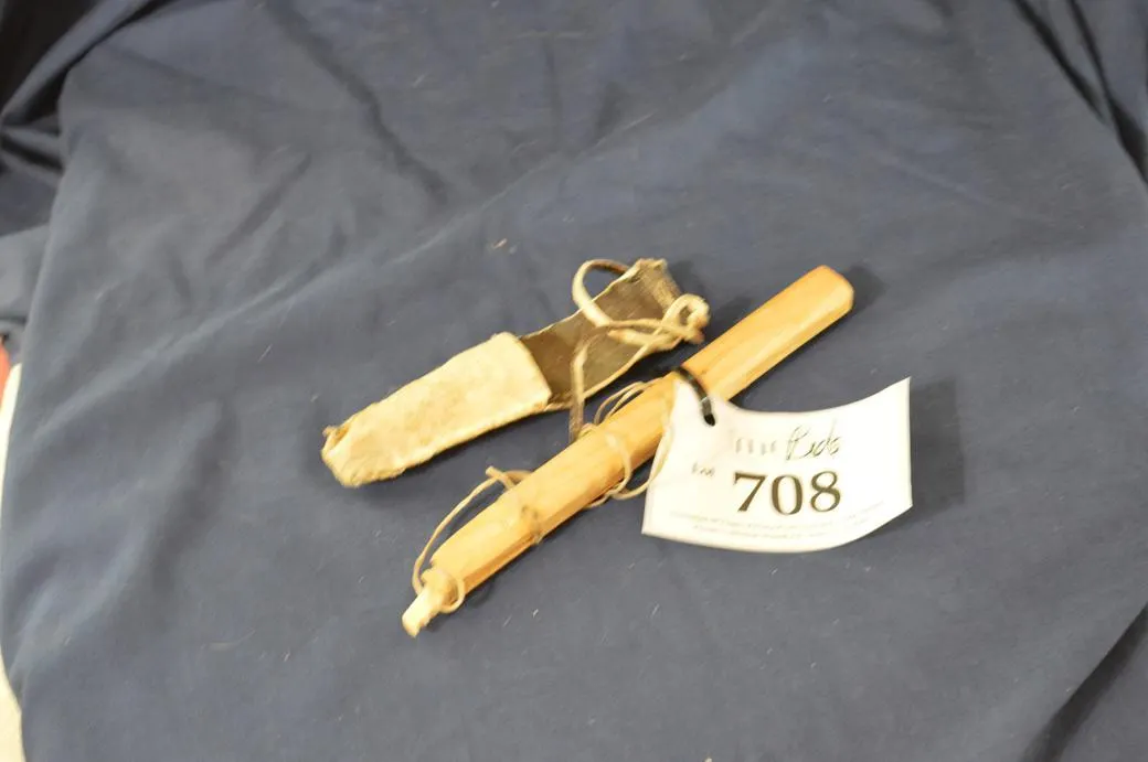 A Saw Of Bone And Wood In A Leather Case