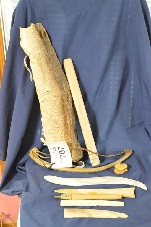 A Jackfish Skin Bag And 8 Wooden Tools That Go Into It.