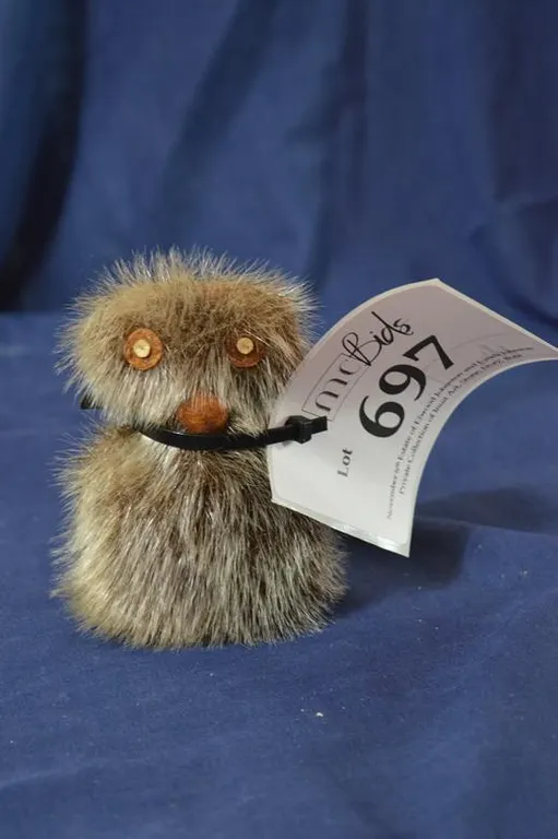 A Small Stuffed Uopik Toy.