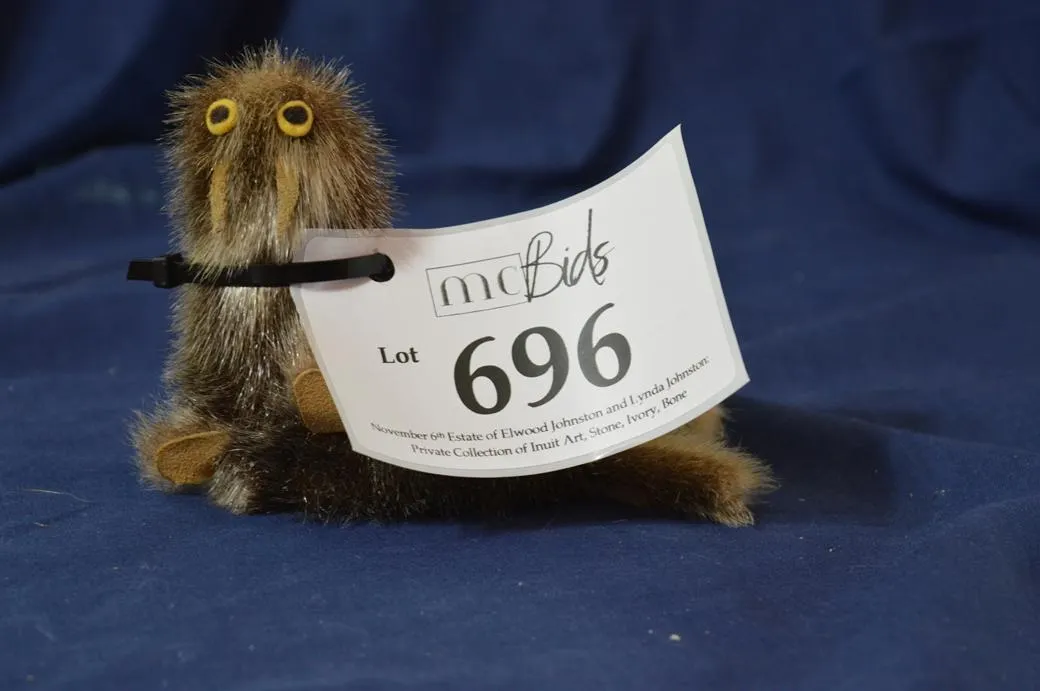 A Small Stuffed Walrus Toy.