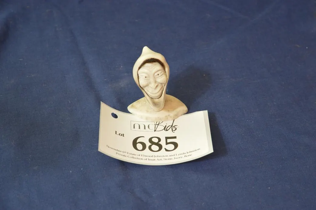 Detailed Carving Of An Old Mans Face With A Big Smile. (Small)