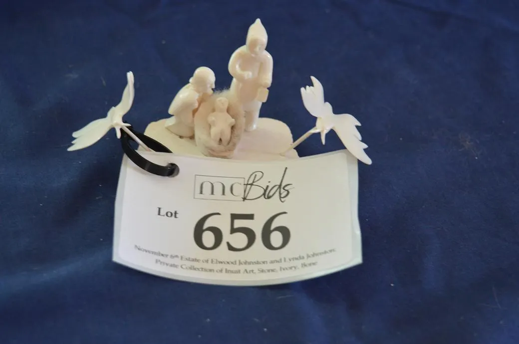 A Nativity Scene, Mary, Joseph And Baby Jesus Under Two Flying Butterflies.