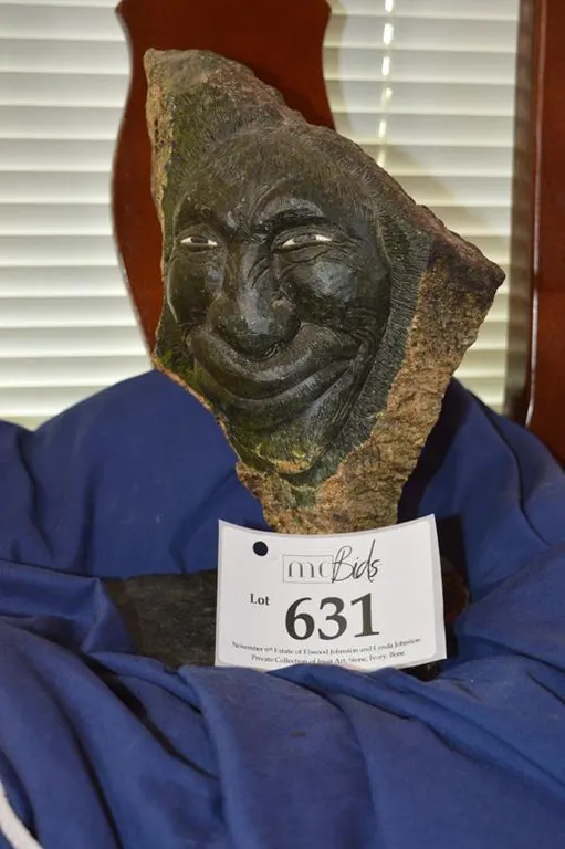 Inuit Mans Face Carved In Serpentine. Whites Of The Eyes Are Inlaid Ivory