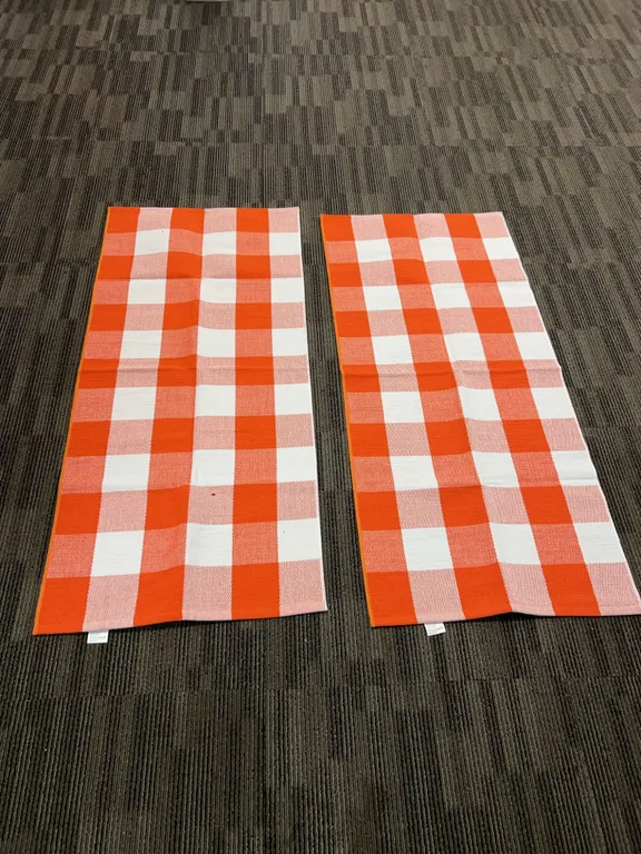 Red and White Checkered Woven Floor Rugs