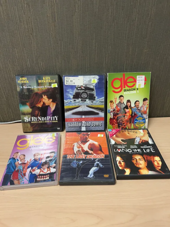 Six Assorted DVD Lot Including Serendipity and Glee Volumes