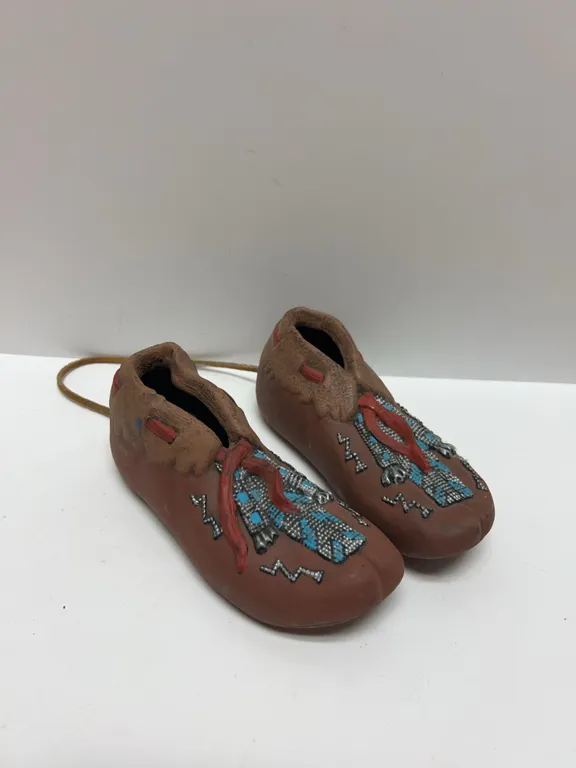 Painted Ceramic Moccasin Figurines with Bead Design