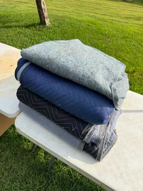 Stack of Quilted Moving Blankets