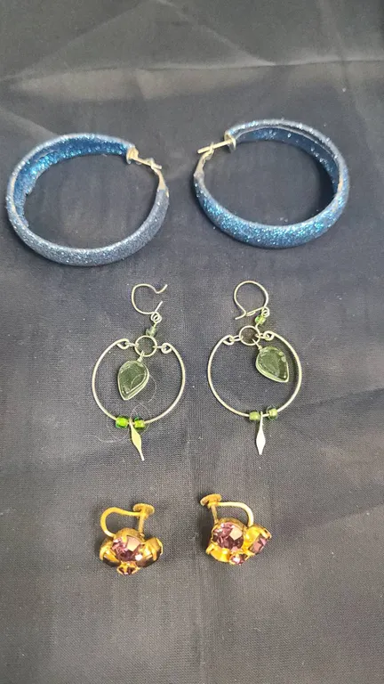 Earrings Lot: Blue Glitter Hoops, Green Glass Dangle Earrings, Gold-Tone Screwback with Purple Stone