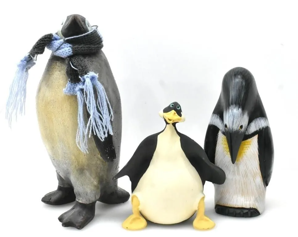 THREE PENGUIN FIGURINES
