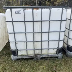 White Poly 1000 L Tote in Cage