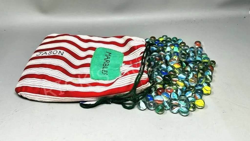 fabric bag of vintage marbles