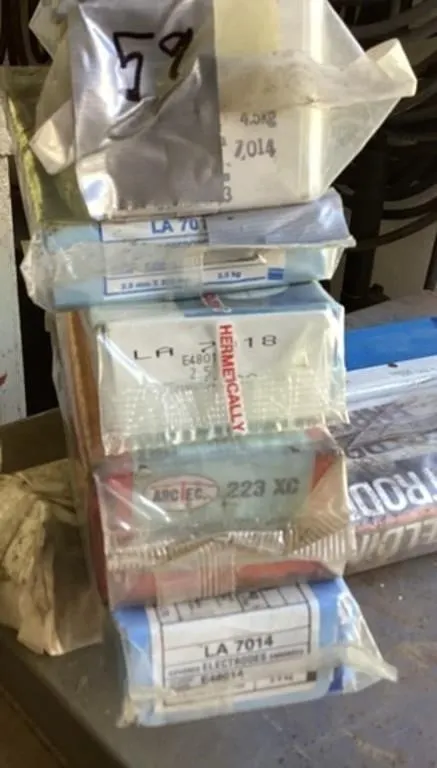 Five sealed boxes welding rods