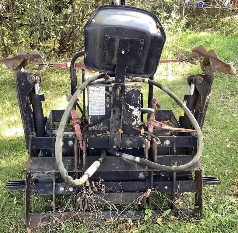 1988 New Holland B 104 backhoe attachment