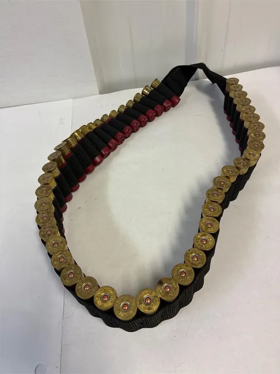 12 gauge. 47 Reloaded 2 3/4” shells canvas belt