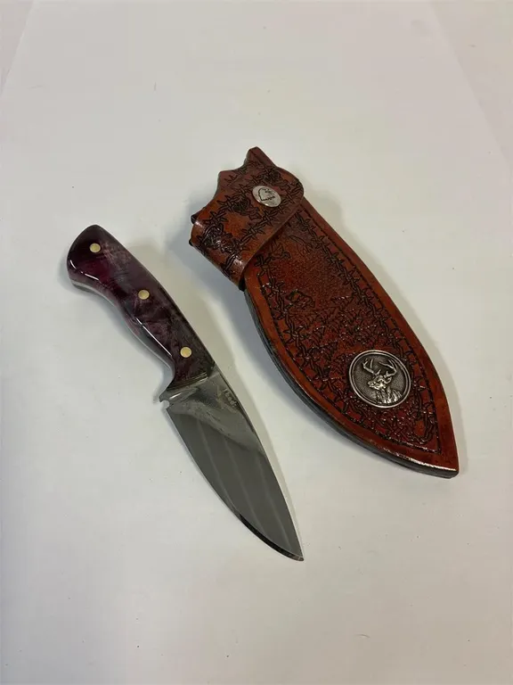 Custom made knife 3.5” blade. Leather sheath
