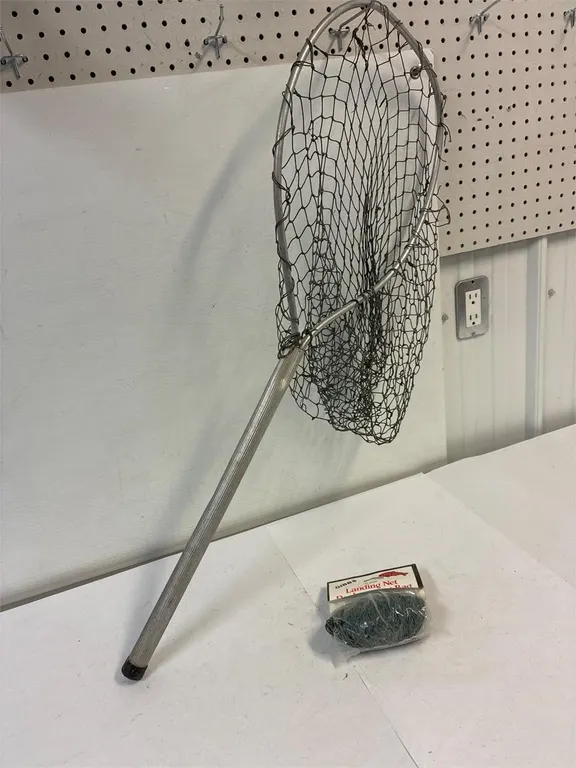 Fish net with new bag. 18” handle