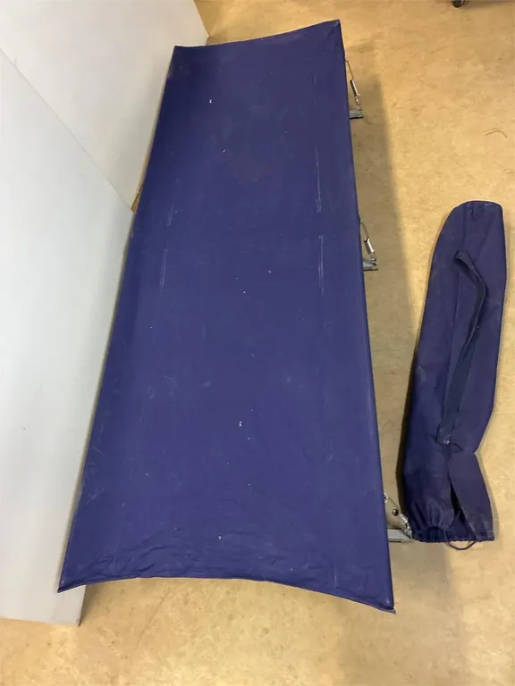 Camping cot. 8” off the ground.