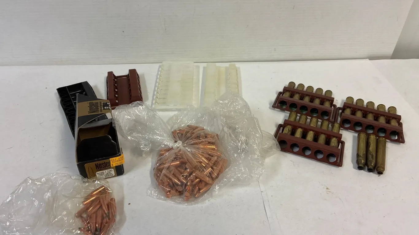6mm bullets & ?? Bullets. 8mm brass casings.