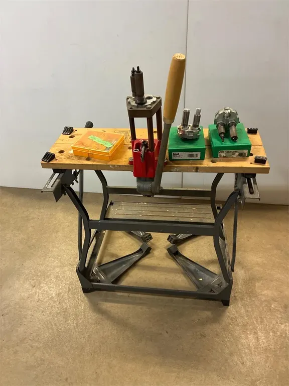 Lee Reloading Press on bench, 243, 338 &7mm dies.