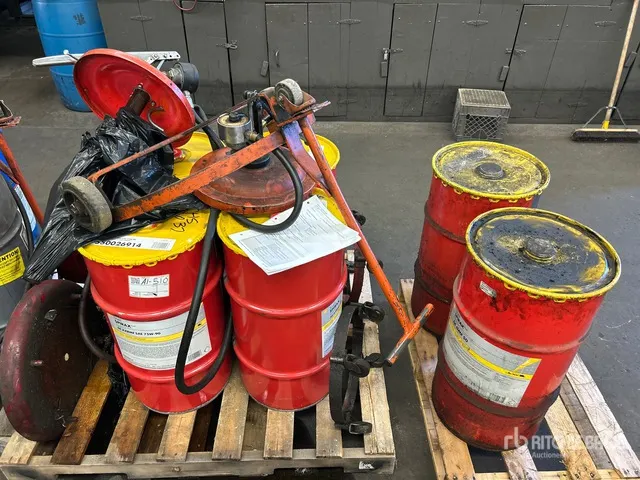 Quantity of (4) Barrels of SAE 75W-90 Oil w/Pumps and Barrel Dolly