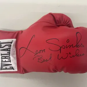 Everlast Boxing Glove Signed "Leon Spinks" - Unauthenticated AND Muhammad Ali "Underwater Training" 