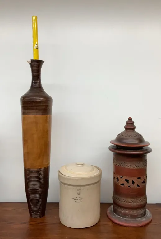 Wood Candle Holder with Bee Candle, Medalta Potteries Crock, and Carved Pottery Lantern
