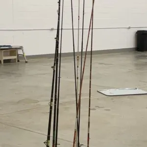 Eight Assorted Fishing Rods in 10-Slot Holder incl. Sage, Temple Fork, Bamboo, Fiberglass