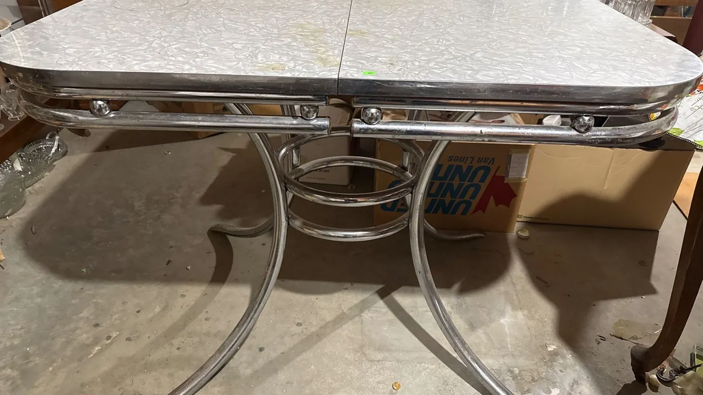 Chrome Table with Grey Patterned Laminate Top and Curved Legs
