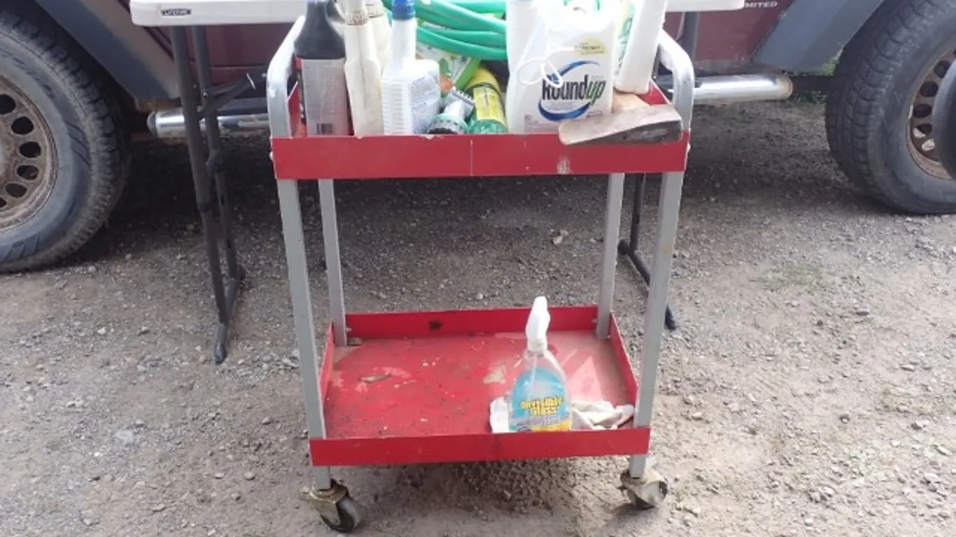 Gardening Tools and Treatments with Metal Rolling Cart