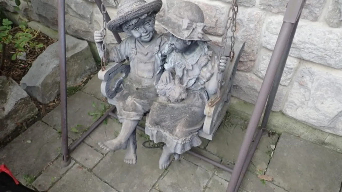Resin Figures on a Swing