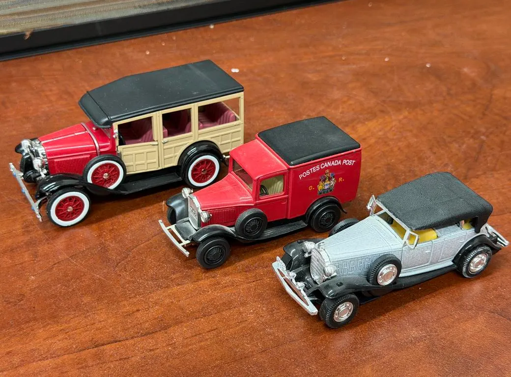 (3) 30's Roll's Royce, P.O. Red Truck, 1929 Ford St Wagon