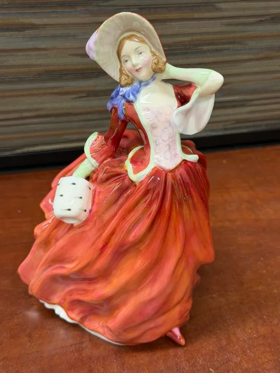 Royal Doulton "Autumn Breezes" Figurine