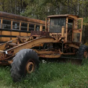 Vintage grader. Not running, but appears mostly complete. Possible project or a construction company