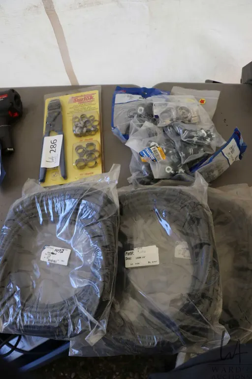 Selection of wire loom, Odel style clamps etc.
