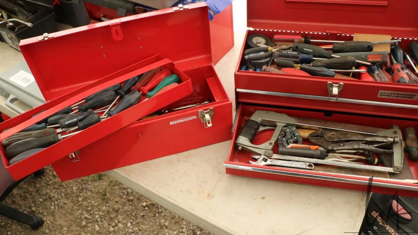Two portable tool boxes containing screwdrivers, hack saw, wrenches etc.
